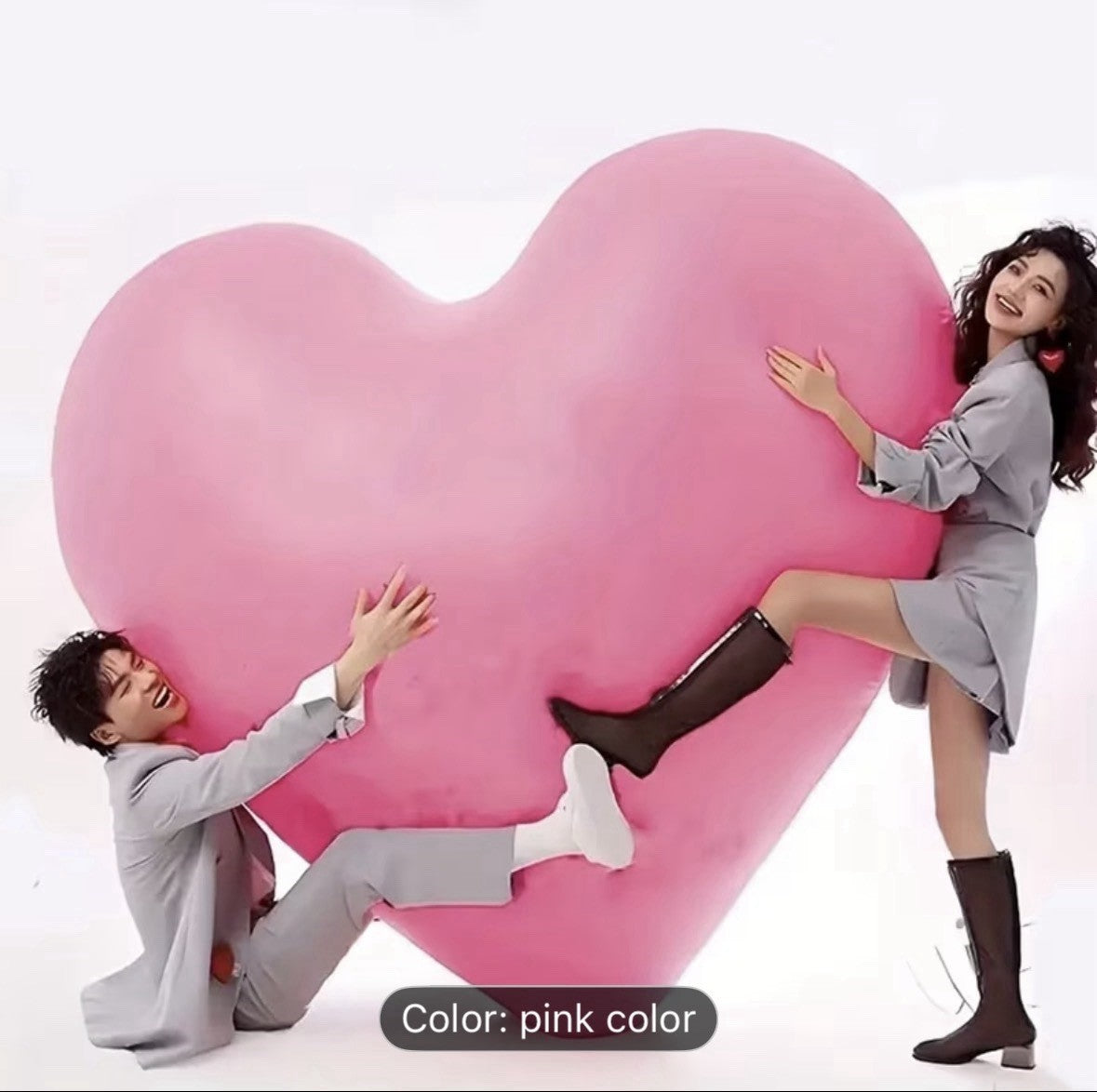 Large pink heart-shaped balloon, party decoration, love & romance theme